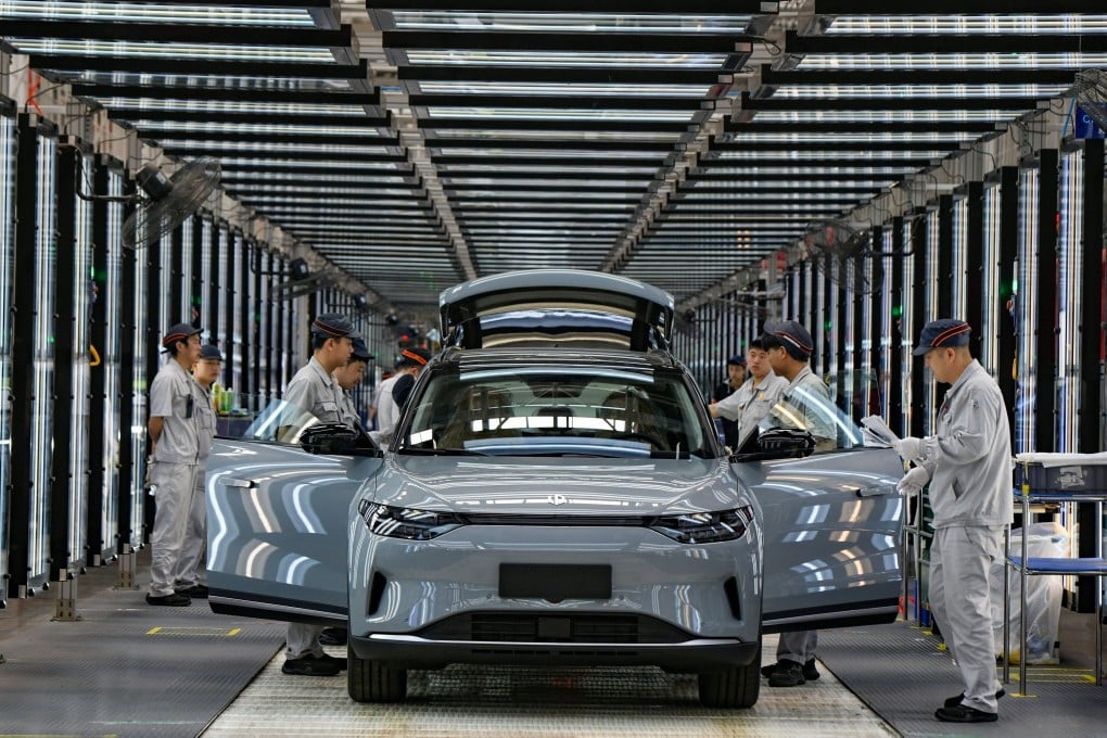 Employees work on the assembly line of new energy vehicles at a factory of Chinese EV startup Leapmotor on April 1 in Jinhua in China’s Zhejiang province. The Biden administration has announced an increase in tariffs on Chinese electric vehicle imports to 100 per cent. Photo: VCG/ Getty Images