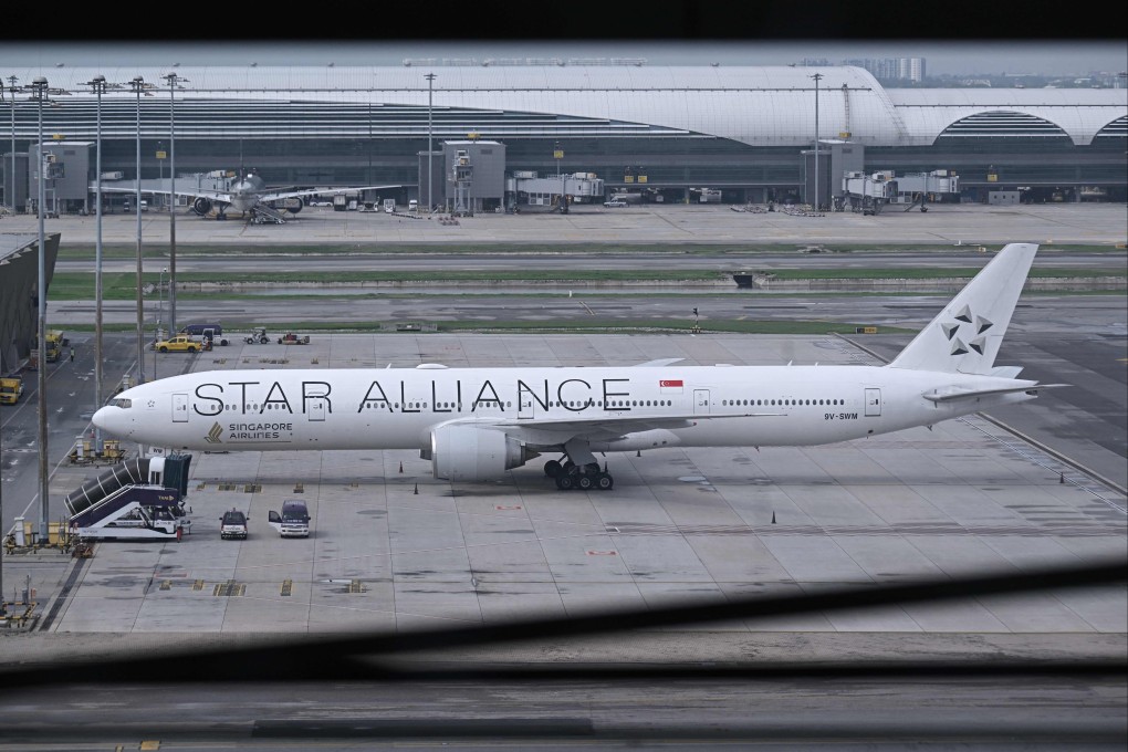 The Singapore Airlines flight SQ321 is seen on the tarmac at the Suvarnabhumi International Airport in Bangkok on Wednesday. Photo: AFP