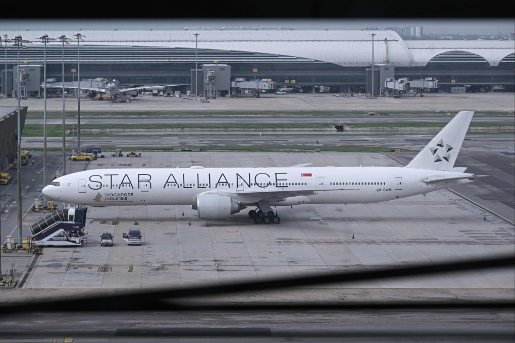 The turbulence-stricken Singapore Airlines plane is parked on the tarmac at Suvarnabhumi International Airport in Bangkok on May 22. Photo: AFP