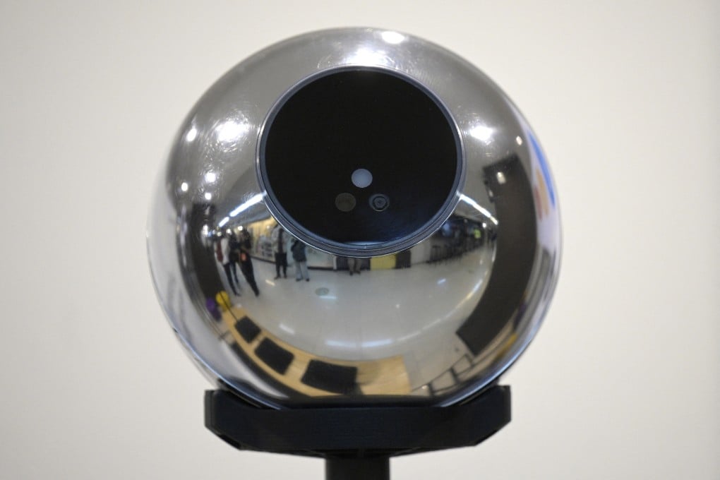 A biometric data scanning device, now banned in Hong Kong, used to scan people’s irises in exchange for cryptocurrency Worldcoin. Photo: AFP