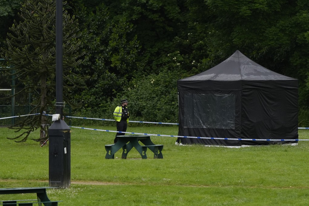 A police welfare tent is seen in Grenfell Park, in Maidenhead, England, close to where the body of Matthew Trickett was found. Photo: AP