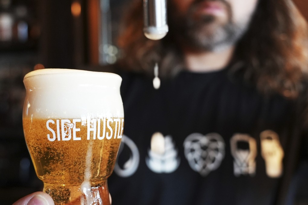 A craft beer from Side Hustle Brews and Spirts, Abu Dhabi’s first brewery. Serving beer in the emirate has been made possible by the relaxation of its laws on alcohol production and consumption, but getting its first brewery off the ground brought challenges. Photo: AP