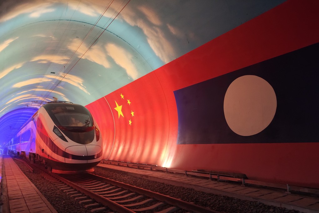 The Lane Xang electric multiple unit train passes by the China-Laos borderline inside a tunnel in October 2021. Photo: Xinhua
