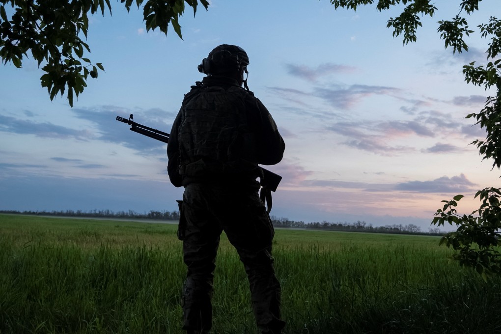 A Ukrainian serviceman guards an area near the town of Vovchansk in Kharkiv region. Photo: Reuters