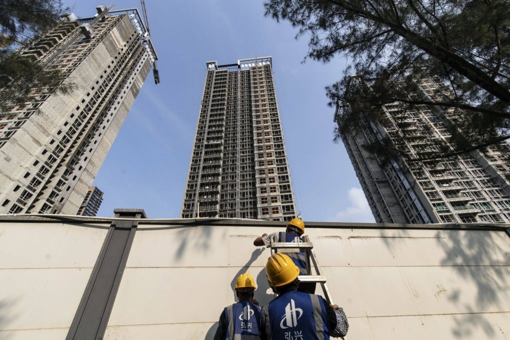 New residential buildings are seen in Shenzhen, Guangdong province. Authorities are taking steps to clear excess housing inventory in the latest move to shore up the nation’s economy. Photo: Bloomberg
