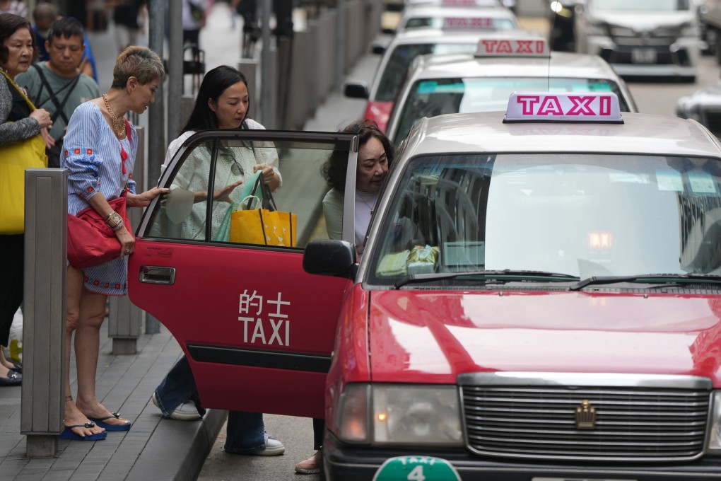 Passengers get into taxis in Causeway Bay on May 7. Both the taxi industry and ride-hailing services such as Uber ought to be better regulated. Photo: Sam Tsang