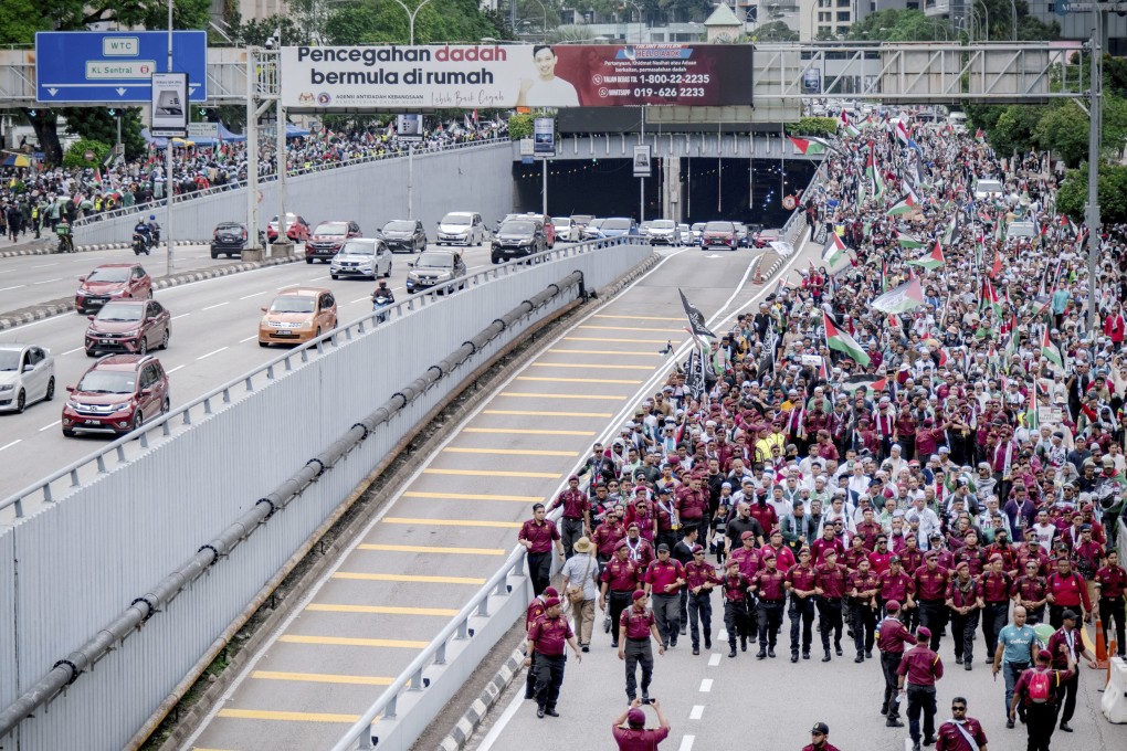 Malaysians take part in a pro-Palestine rally in Kuala Lumpur on May 4. Photo: Kyodo
