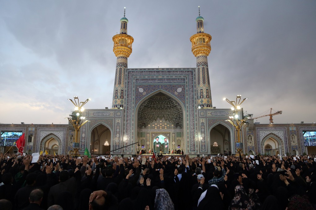 Iranians mourn during their late president Ebrahim Raisi at the Imam Reza shrine in Mashhad on Thursday. Photo: EPA-EFE