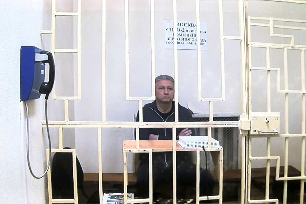 Russian Deputy Defence Minister Timur Ivanov behind bars in a courtroom in Moscow, earlier this month. Moscow City Court via AP