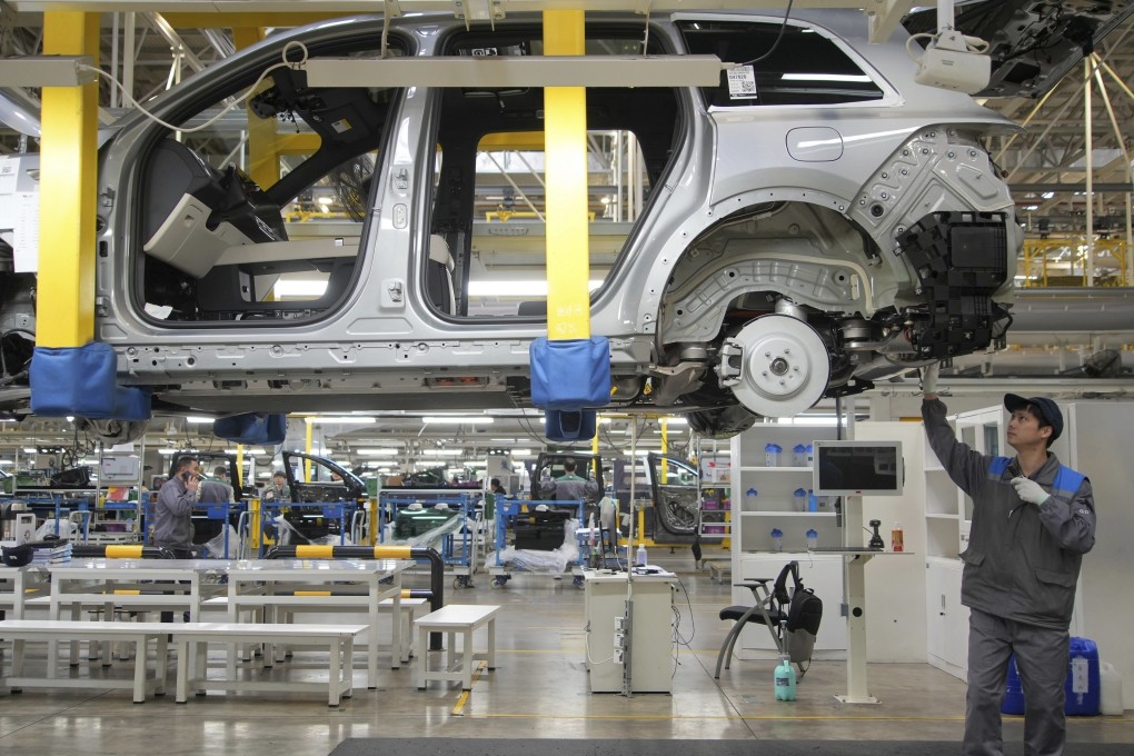 Beijing is flooding global markets with underpriced Chinese electric vehicle exports, US President Joe Biden says. Pictured is a Li Auto factory in China. Photo: AP