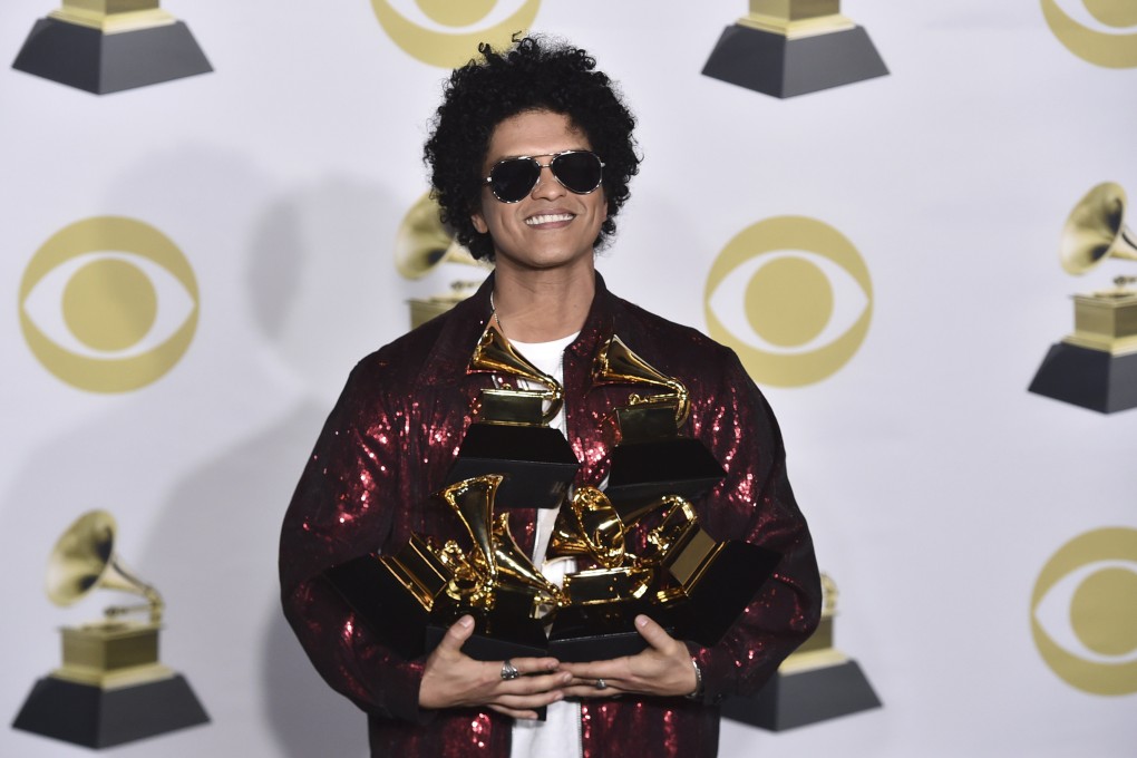 Singer Bruno Mars with his Grammy awards in 2018. Photo: AP