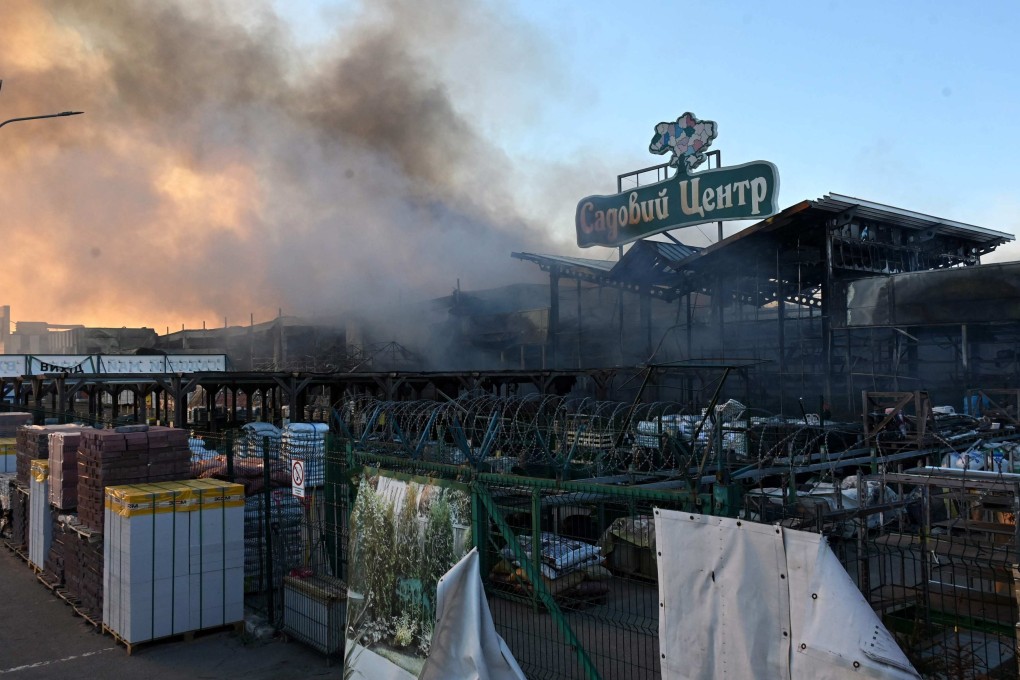 Smoke rises following an air strike on a hardware superstore, in Kharkiv, on Saturday. Photo: AFP