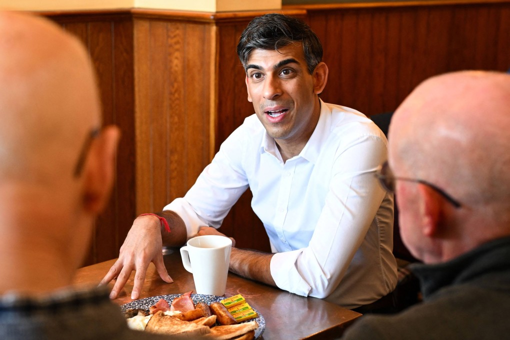 Britain’s Prime Minister Rishi Sunak meets veterans at a community breakfast in Northallerton, North Yorkshire, on Saturday. Photo: AFP
