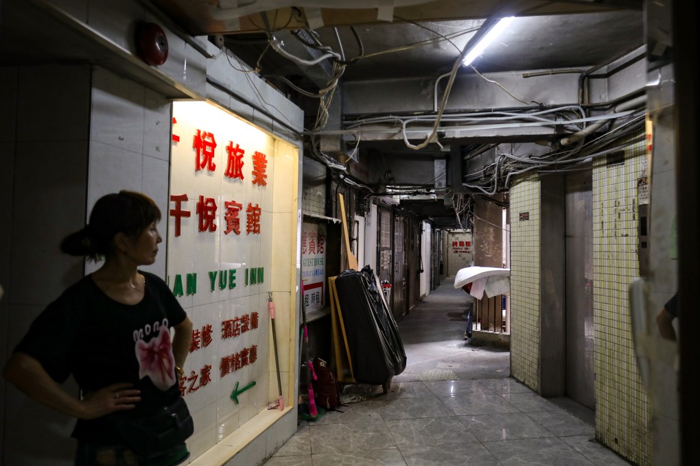 Some residents and businesses have returned to New Lucky House following the fatal fire. Photo: Xiaomei Chen