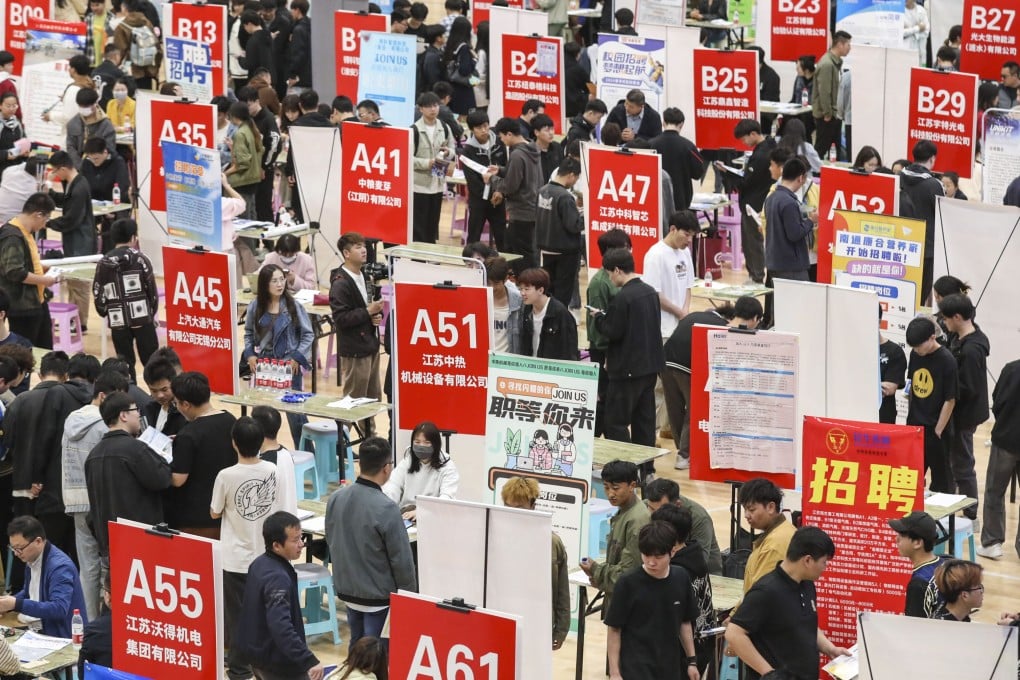 Students attend a campus job fair in the east China city of Huai’an on April 27. Photo: NurPhoto via Getty Images