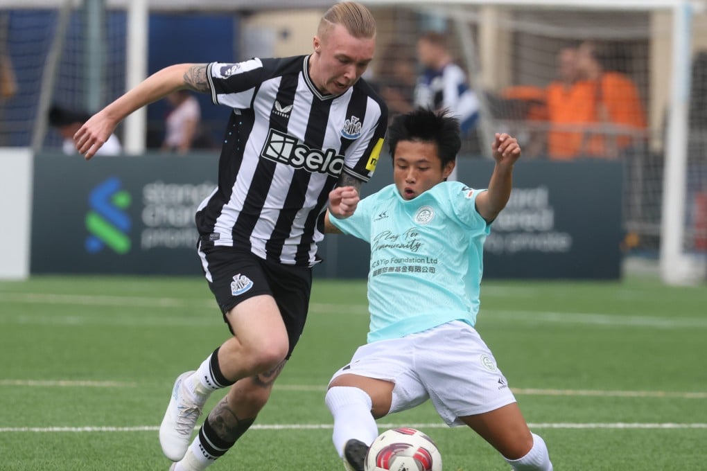 Newcastle United’s Alfe Harrison (left) fights for the ball with Football Club’s Yam Pung-pang at the HKFC Soccer Sevens. Photo: Yik Yeung-man