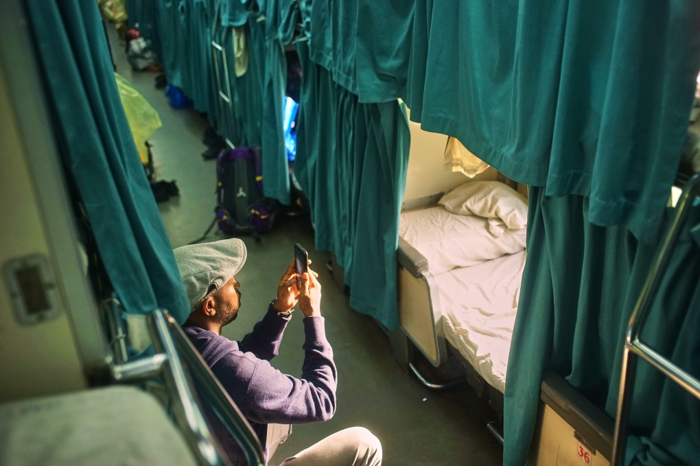A passenger on the “Jungle Train” sleeper service, which rumbles 526km northwards overnight through the spine of Peninsular Malaysia to the Thai border. Photo: Amirul Ruslan