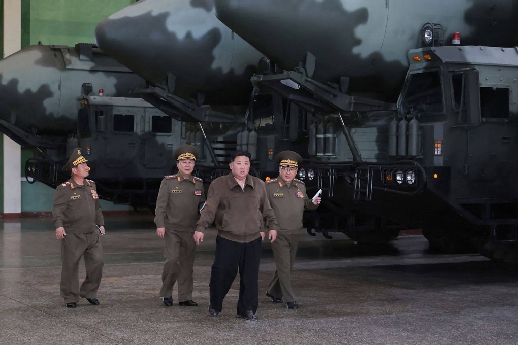 North Korean leader Kim Jong-un visits a defence industrial complex at an undisclosed location in North Korea. Photo: KCNA via KNS/AFP