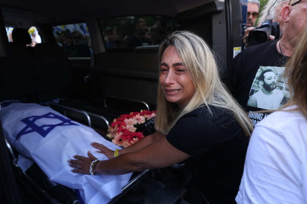 Relatives at the funeral for Hanan Yablonka, whose body was recovered from Gaza on Friday. Photo: AFP