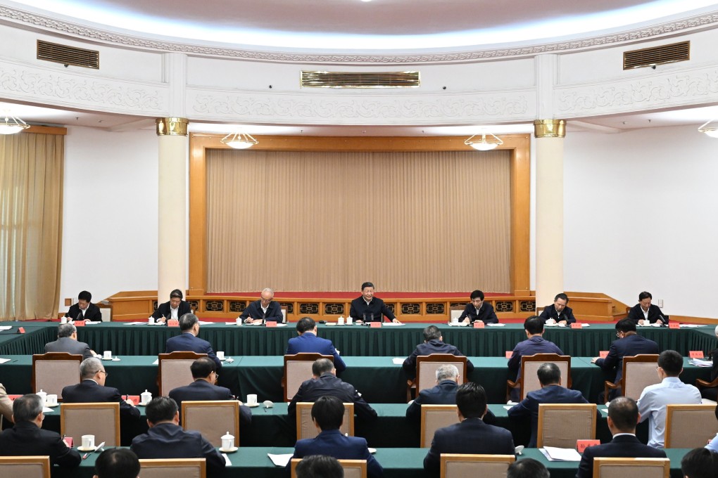 President Xi Jinping communicates with representatives from businesses and academia attending a symposium in Jinan. Photo: Xinhua