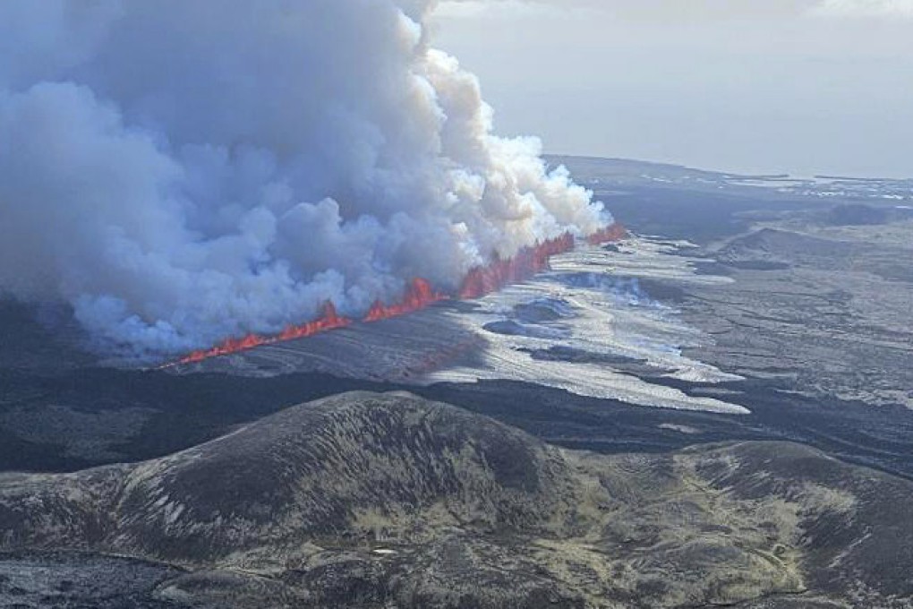 A volcano in southwestern Iceland is erupting, spewing red streams of lava in its latest display of nature’s power. Photo: Iceland Civil Defense via AP