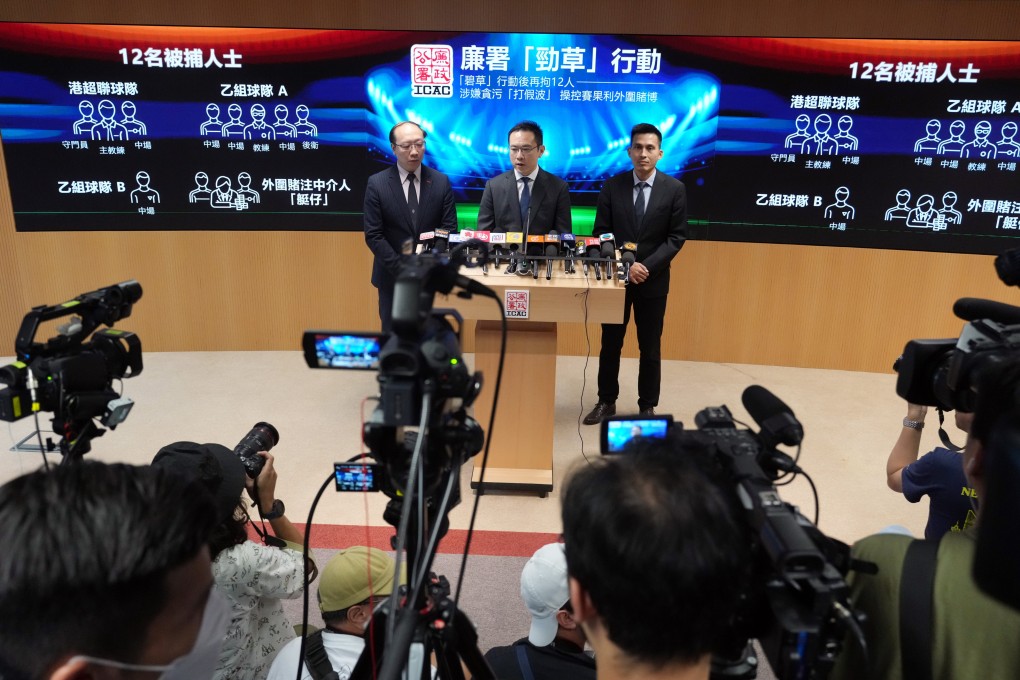 ICAC officials including Principal Investigator Matthew Chang (centre) brief the media on the arrests. Photo: May Tse