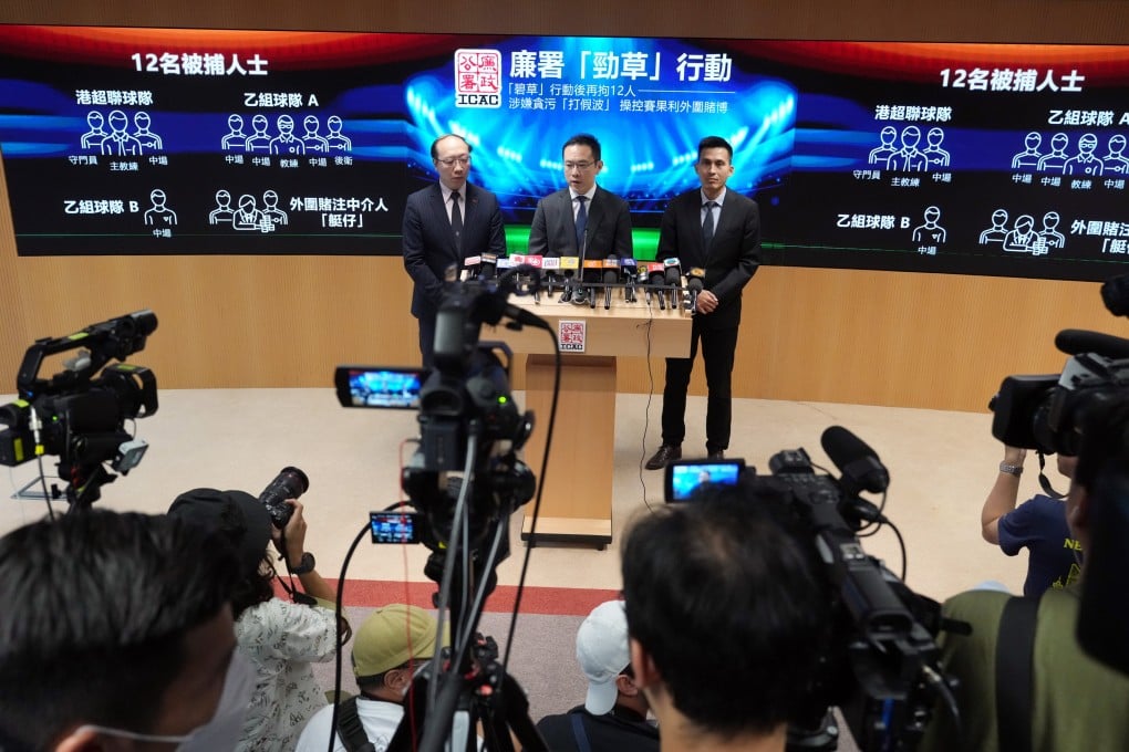 ICAC officials including Principal Investigator Matthew Chang (centre) brief the media on the arrests. Photo: May Tse