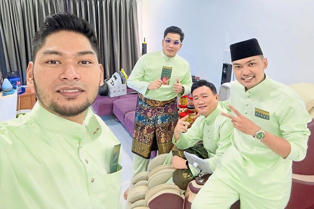 Michael Tong Wai Siong (second from right) with his adopted Malay sons (from left) Rasyid, Rafie and Abdul Rahman. Photo: Instagram/thestaronline