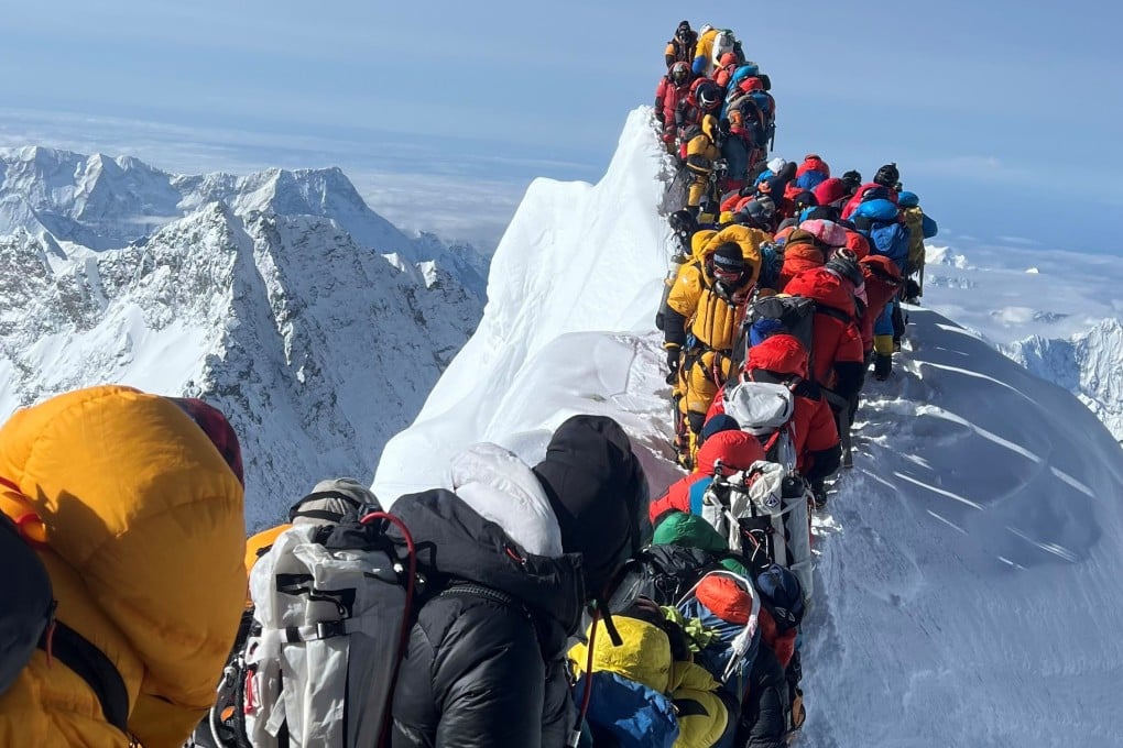 Climbers and mountain guides are stranded between the South Summit and the Hillary Step of Mount Everest on May 21 after an ice collapse destroyed the fixed ropes used for climbing. The collapse was responsible for two of the eight known deaths on the peak in the spring climbing season. Photo: Getty Images