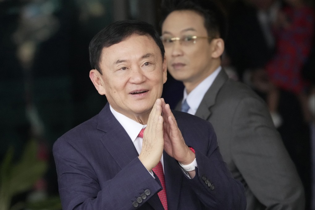 Thailand’s former Prime Minister Thaksin Shinawatra at Don Muang airport in Bangkok, Thailand. Photo: AP