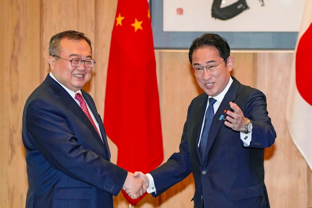 Liu Jianchao, head of the Communist Party’s International Department, with Japanese Prime Minister Fumio Kishida in Tokyo on Wednesday. Photo: Kyodo