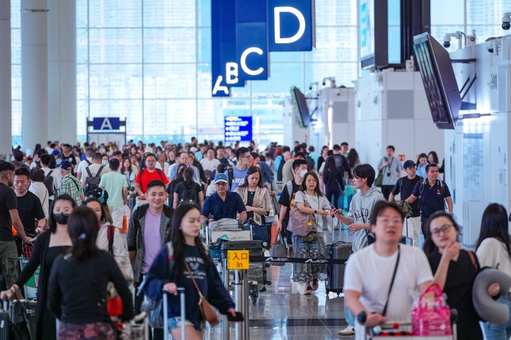 Travellers throng Hong Kong International Airport during the Labour Day Golden Week holidays on May 1, 2024. Photo: Eugene Lee