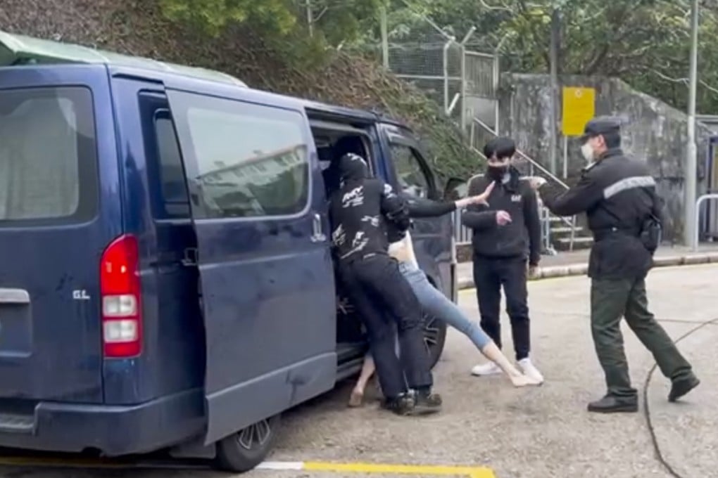 The abduction was captured in footage that circulated online. A prison officer (right) is seen intervening, Photo: Handout