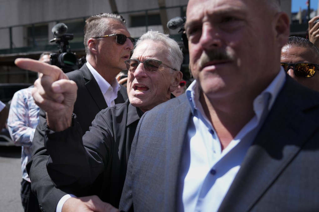 Robert De Niro argues with a Donald Trump supporter on Tuesday. Photo: AP