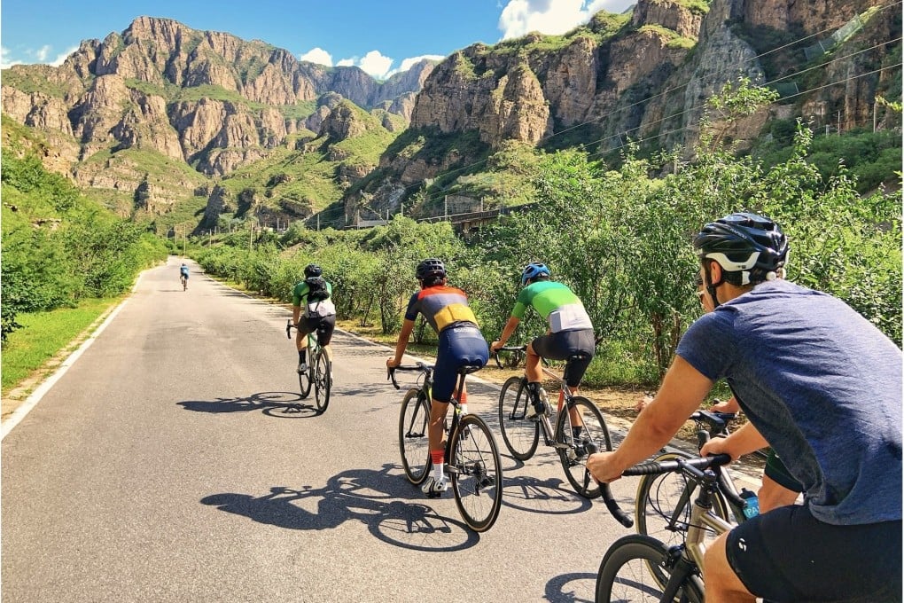 A group of cyclists hit the hills outside Beijing. Ultra-cycling trips in which riders leave the city to cycle day and night, sometimes covering hundreds of kilometres, have taken off, spurred by the pandemic. Cyclists take advantage of the wide, well-paved roads. Photo: Paul McNeill