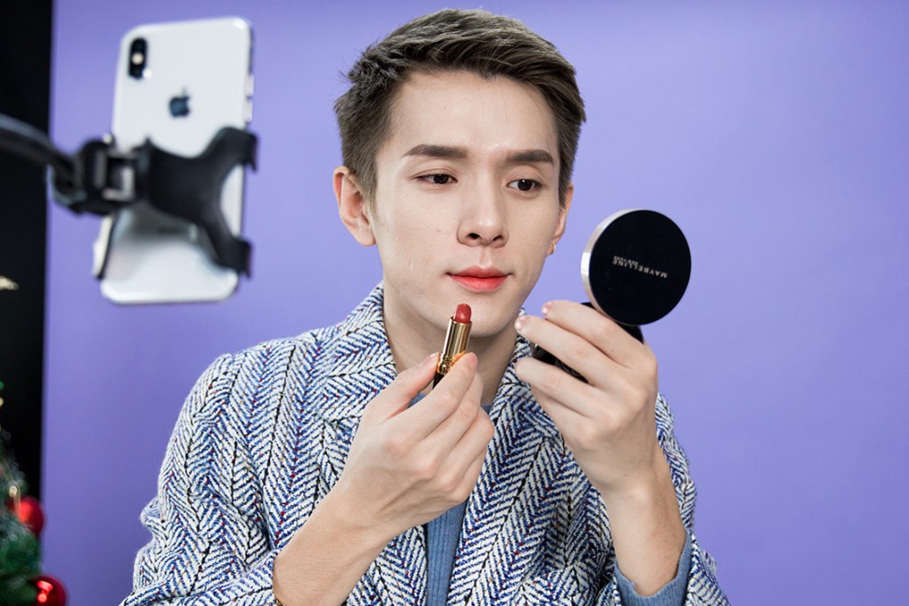 Mega influencer Li Jiaqi, known as the “Lipstick King”, applies lipstick while livestreaming. Celebrity live-streamers like him, with their large fan bases and selling power, are becoming an increasingly significant part of the Chinese economy. Photo: Getty Images