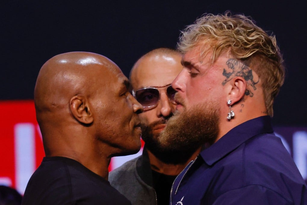 Mike Tyson (left and YouTuber Jake Paul face off during a press conference at the Apollo Theatre in New York, on May 13, 2024. Photo: AFP