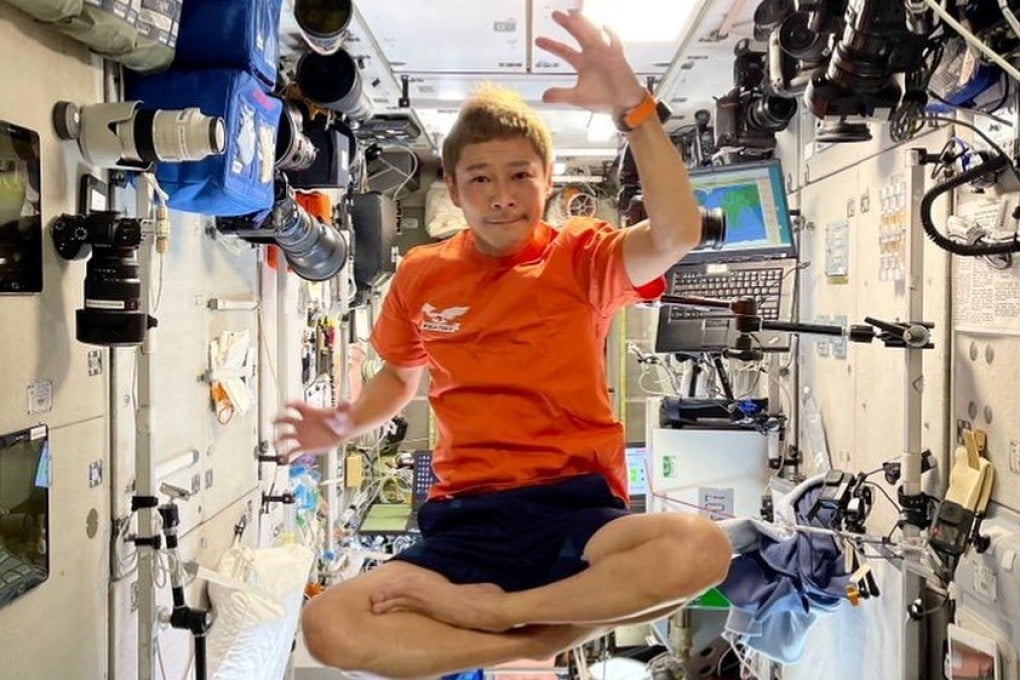 Japanese billionaire Yusaku Maezawa floats inside the International Space Station in 2021. Photo: Reuters