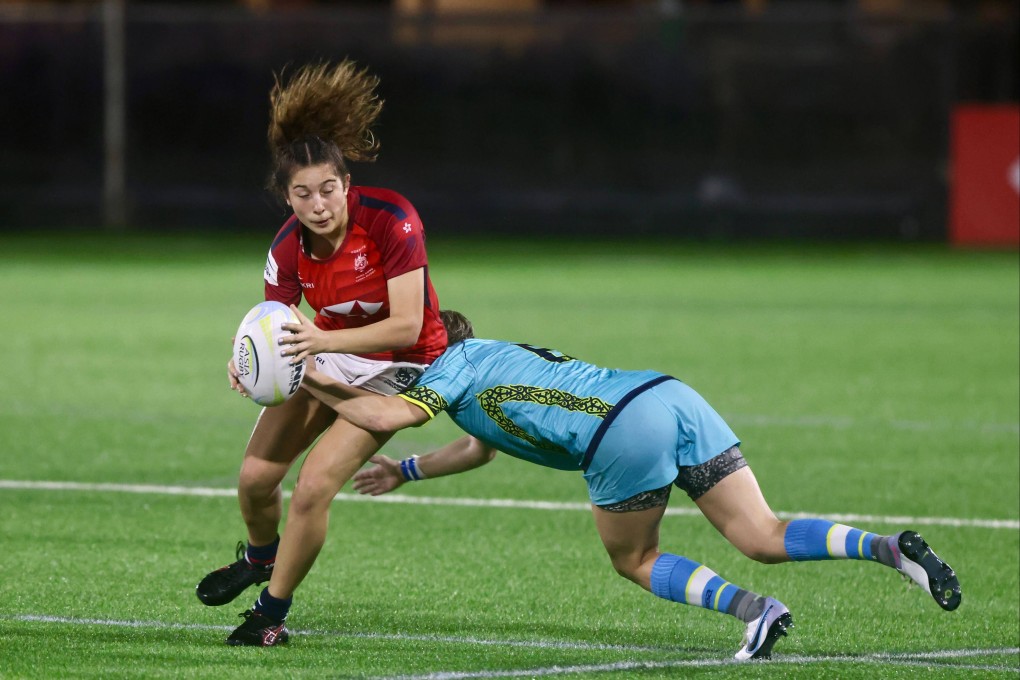 Hong Kong’s Georgia Rivers (left) is tackled by Kazhakstan’s Mariya Grishina in their Asia Rugby Championship clash.  Photo: Jonathan Wong