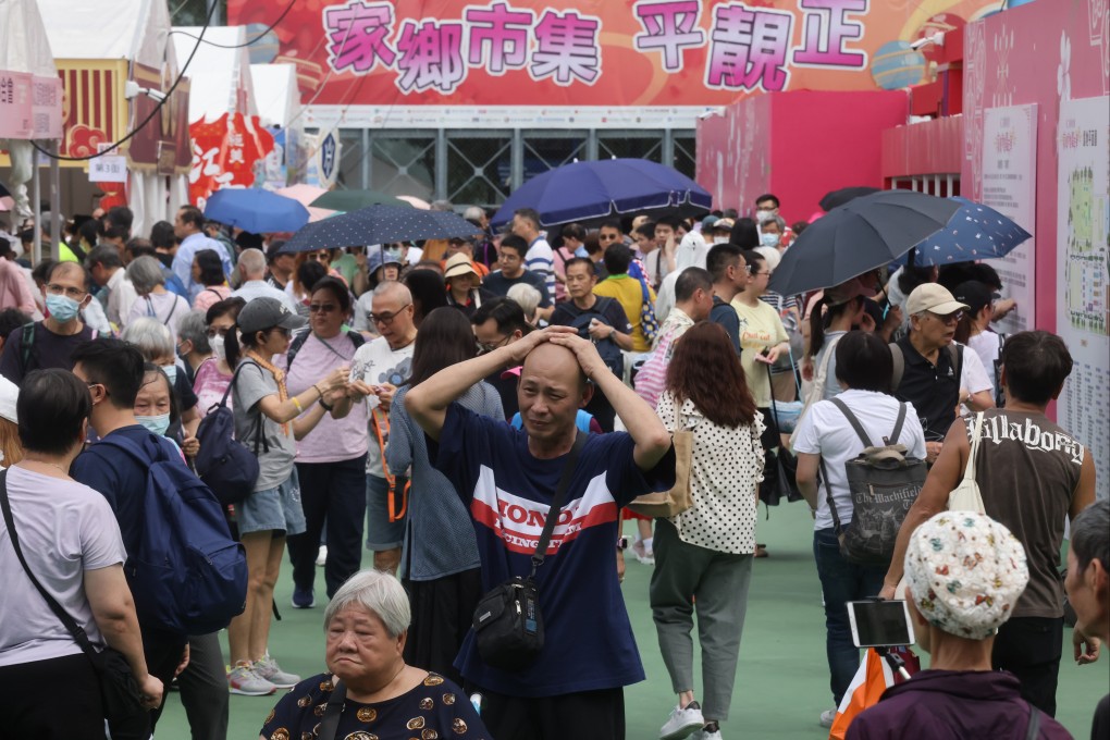 Crowds at the “Hometown Market” food carnival at Victoria Park. Photo: Jonathan Wong
