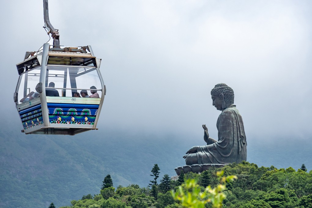 A Ngong Ping 360 cable car approaches the site of the city’s famous “Big Buddha” statue. Photo: Shutterstock