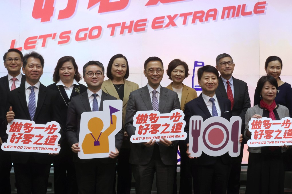 Tourism minister Kevin Yeung (centre), along with other officials, launched the city’s hospitality campaign on Monday. Photo: Jonathan Wong