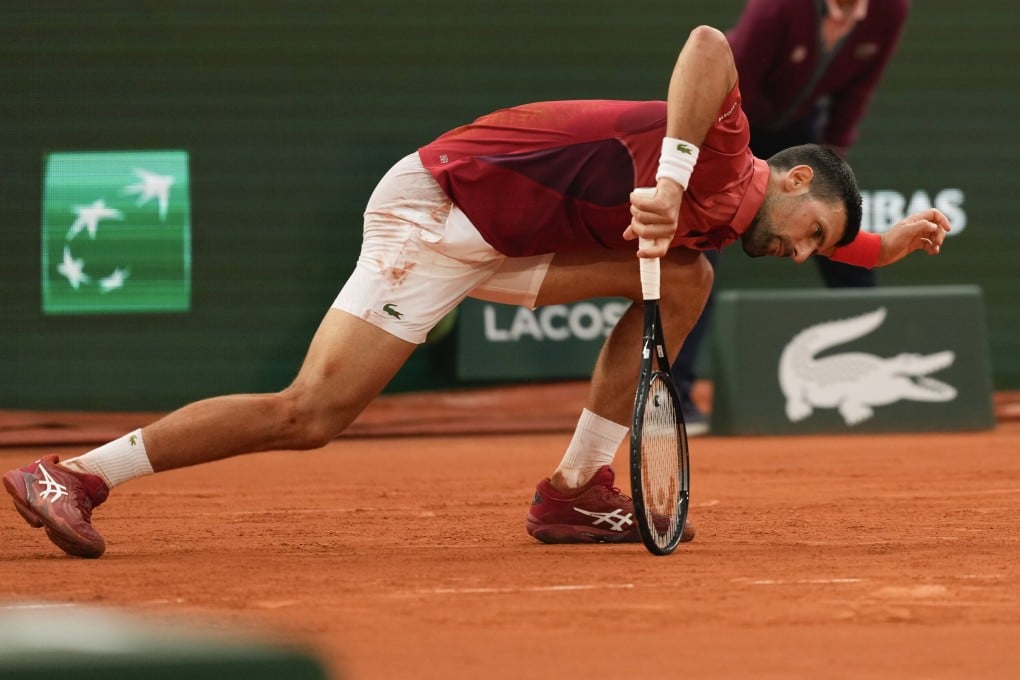 Serbia’s Novak Djokovic slipped during his fourth round match of the French Open tennis tournament against Argentina’s Francisco Cerundolo at the Roland Garros stadium in Paris on Monday. Photo: AP