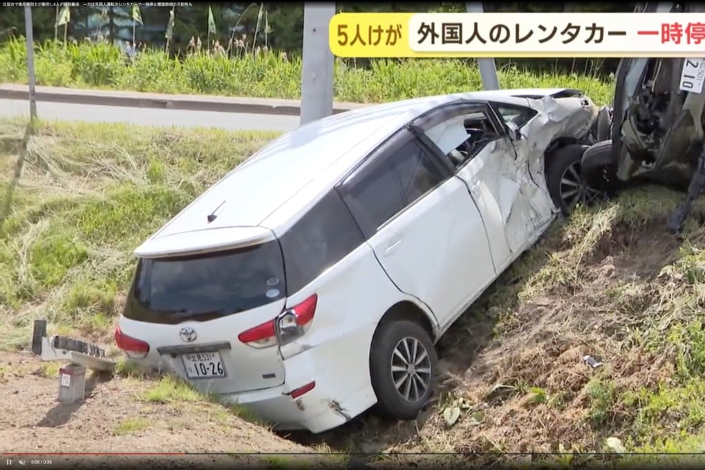A picture taken after the crash shows a wrecked car on a roadside slope. Photo: Handout