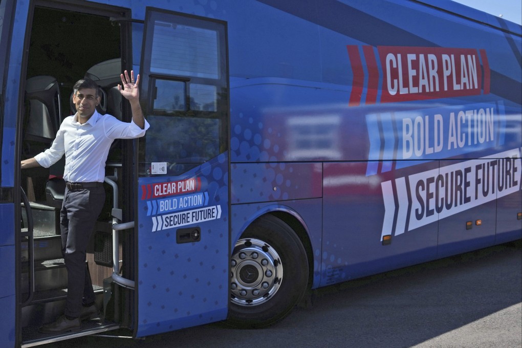 Britain’s Prime Minister Rishi Sunak on a Conservative campaign bus on Saturday. Photo: AP