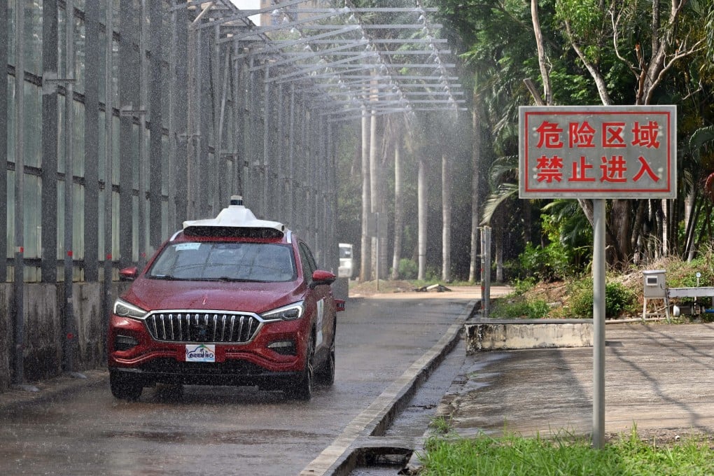 A car being tested for self-driving in rainy weather in Qionghaiin southern China’s Hainan province. Photo: Xinhua