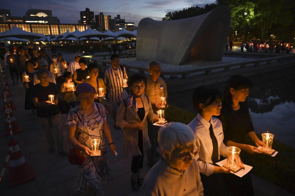 A candelit procession in Hiroshima’s Peace Memorial Park last year to commemorate the victims of the 1945 atomic bombing. Photo: Kyodo