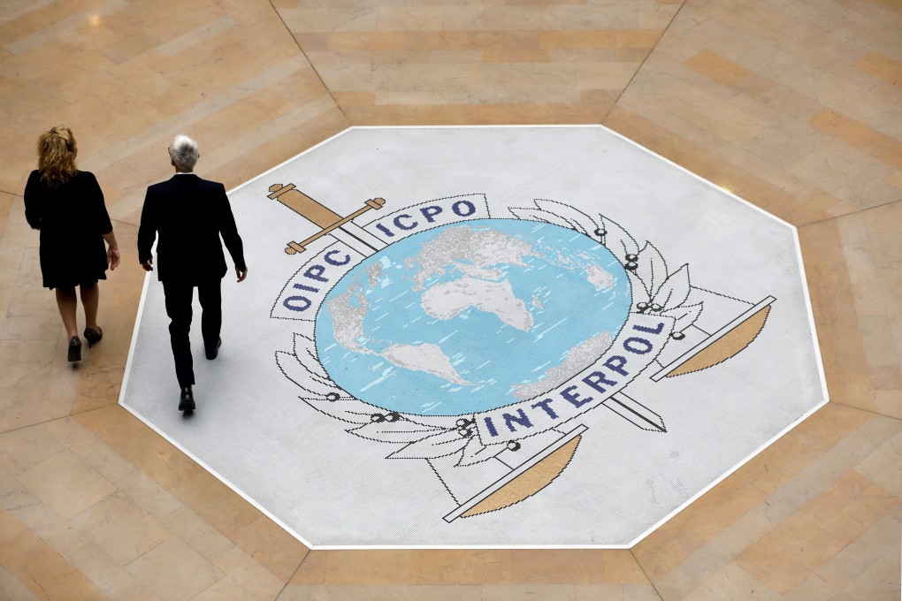 The Interpol logo at the international police agency headquarters in Lyon, central France. File photo: AP