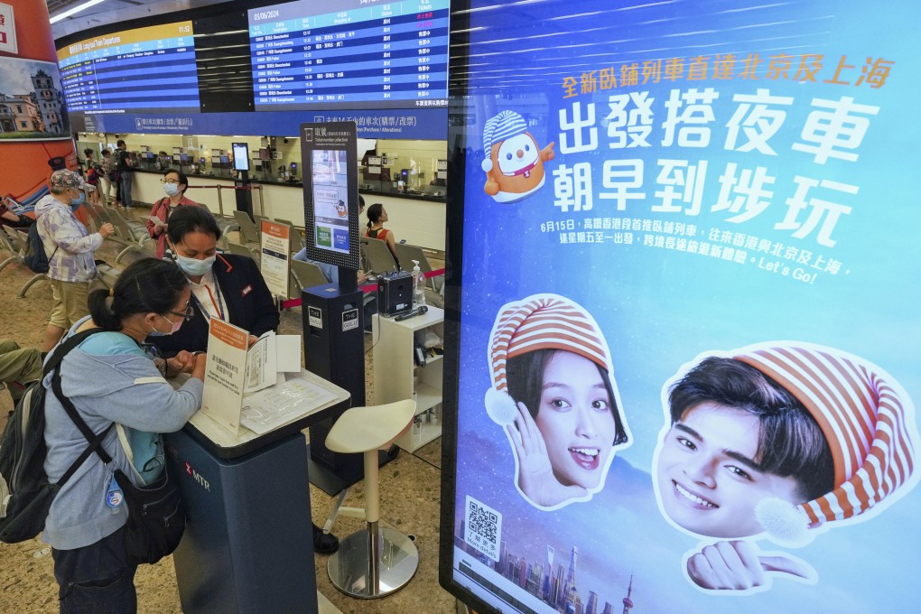 Customers at West Kowloon station looking to buy tickets for the newly launched high-speed sleeper trains connecting to Shanghai and Beijing. Photo: Elson Li