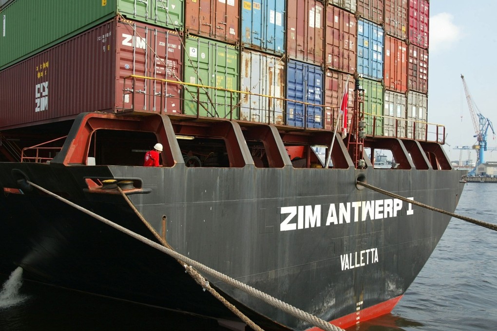 A cargo vessel owned by Israeli shipping firm Zim docked at the port of Hamburg, Germany. File photo: AP